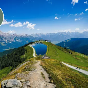 The mountain air, wildflowers and grazing cows of the Austrian Alps are only a train ride away from the city © iStock / Getty Images Plus