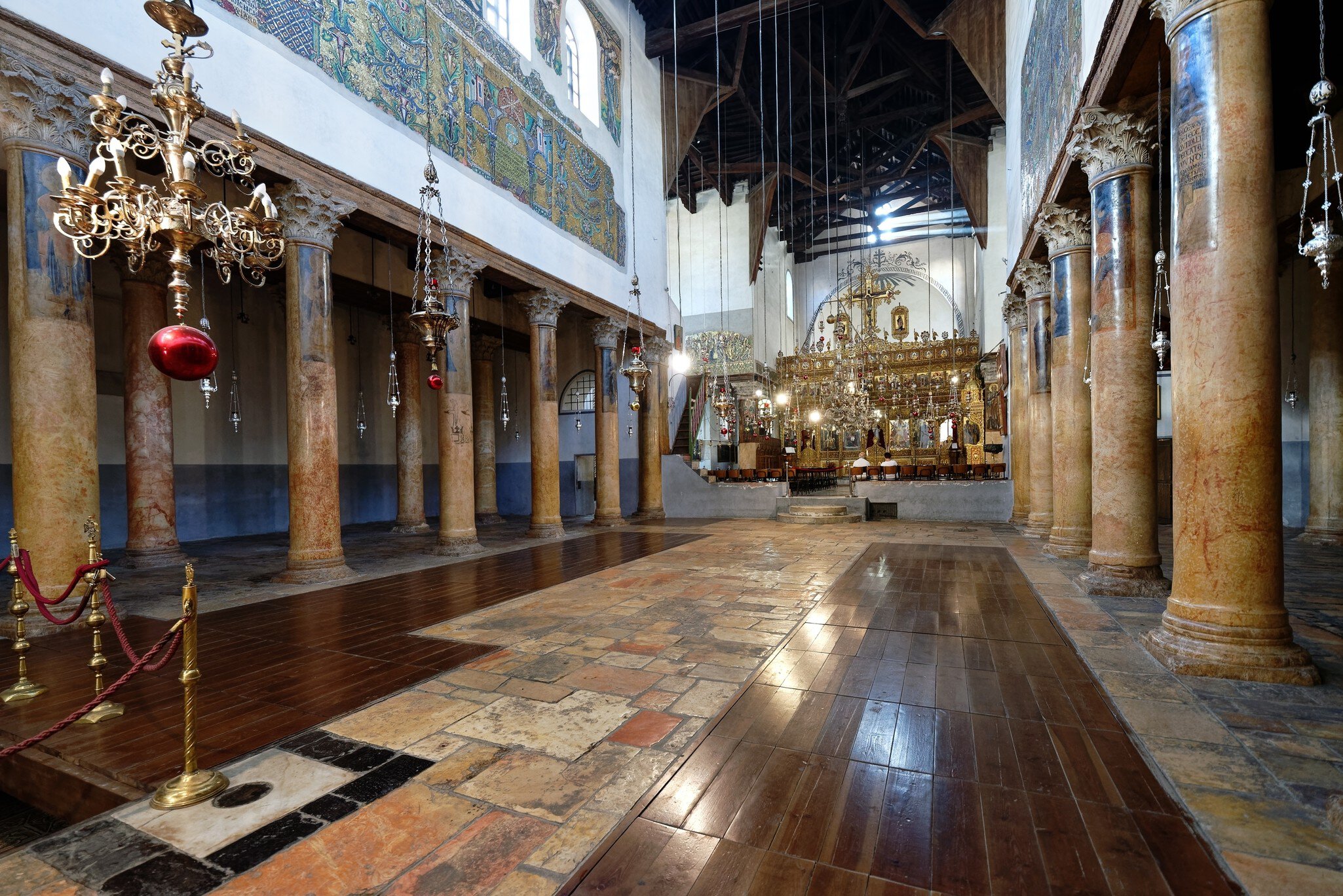BETHLEHEM, ISRAEL - JUNE 24,2023:The interior of the Nativity church, Bethlehem, West bank, Israel. The Church of the Nativity in Bethlehem is one of the most important Christian pilgrimage sites; Shutterstock ID 2330490397;
