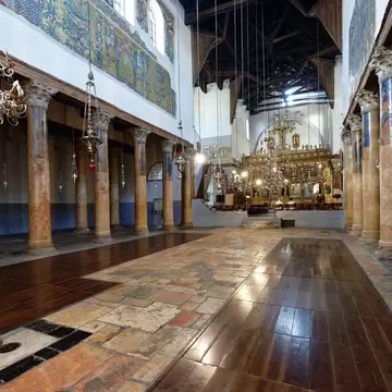 BETHLEHEM, ISRAEL - JUNE 24,2023:The interior of the Nativity church, Bethlehem, West bank, Israel. The Church of the Nativity in Bethlehem is one of the most important Christian pilgrimage sites; Shutterstock ID 2330490397;