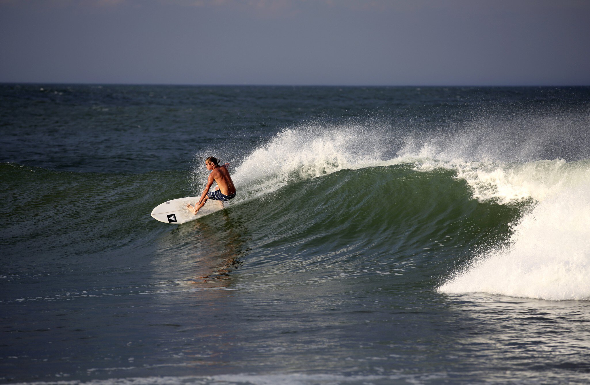 Surfing tropical waves at Pottuvil Point