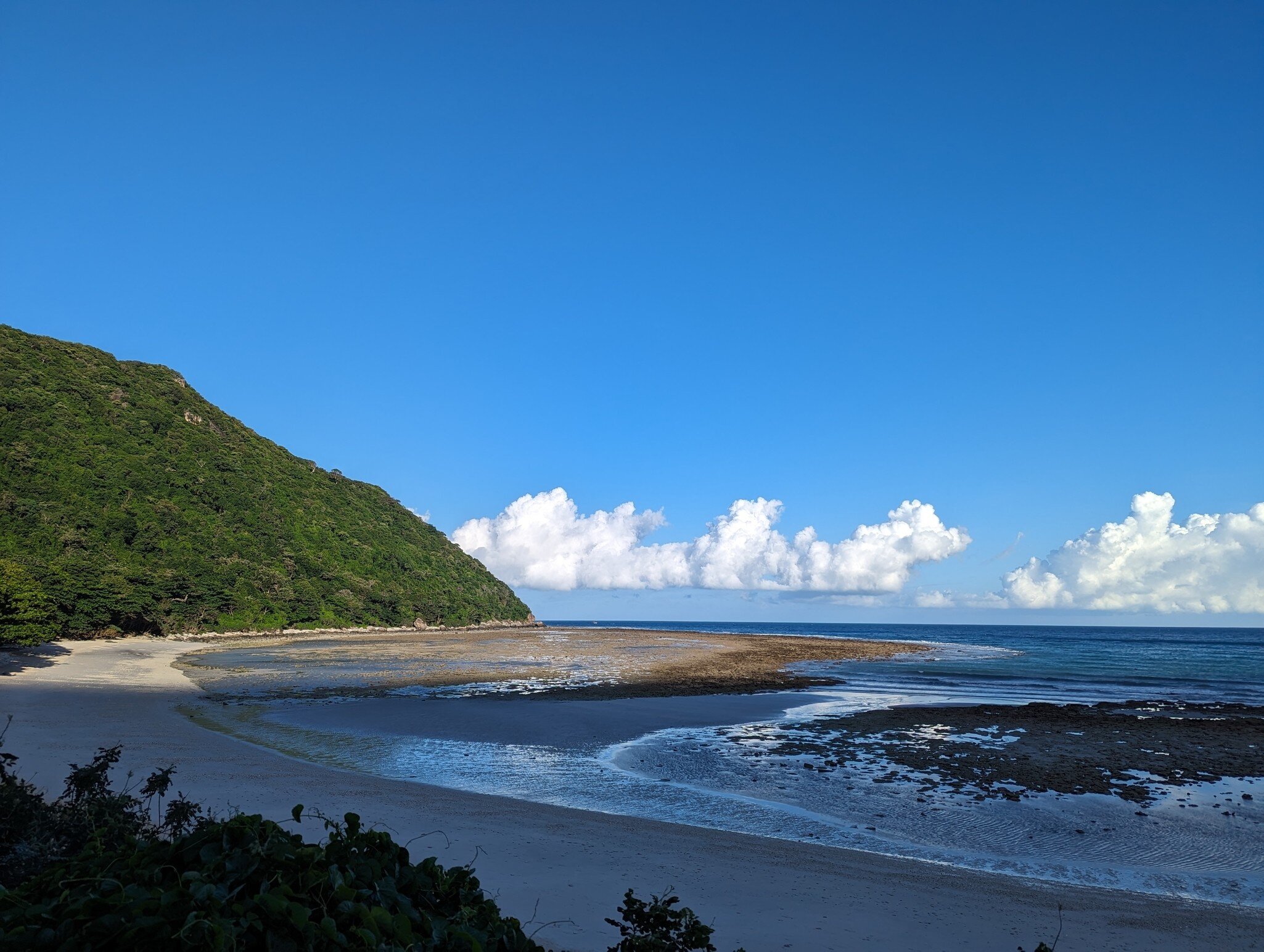 View over Bay Canh sea turtle beach, a protected area in Con Dao National Park at sunset in Vietnam.