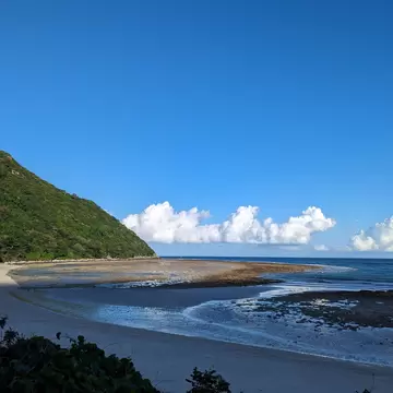 View over Bay Canh sea turtle beach, a protected area in Con Dao National Park at sunset in Vietnam.