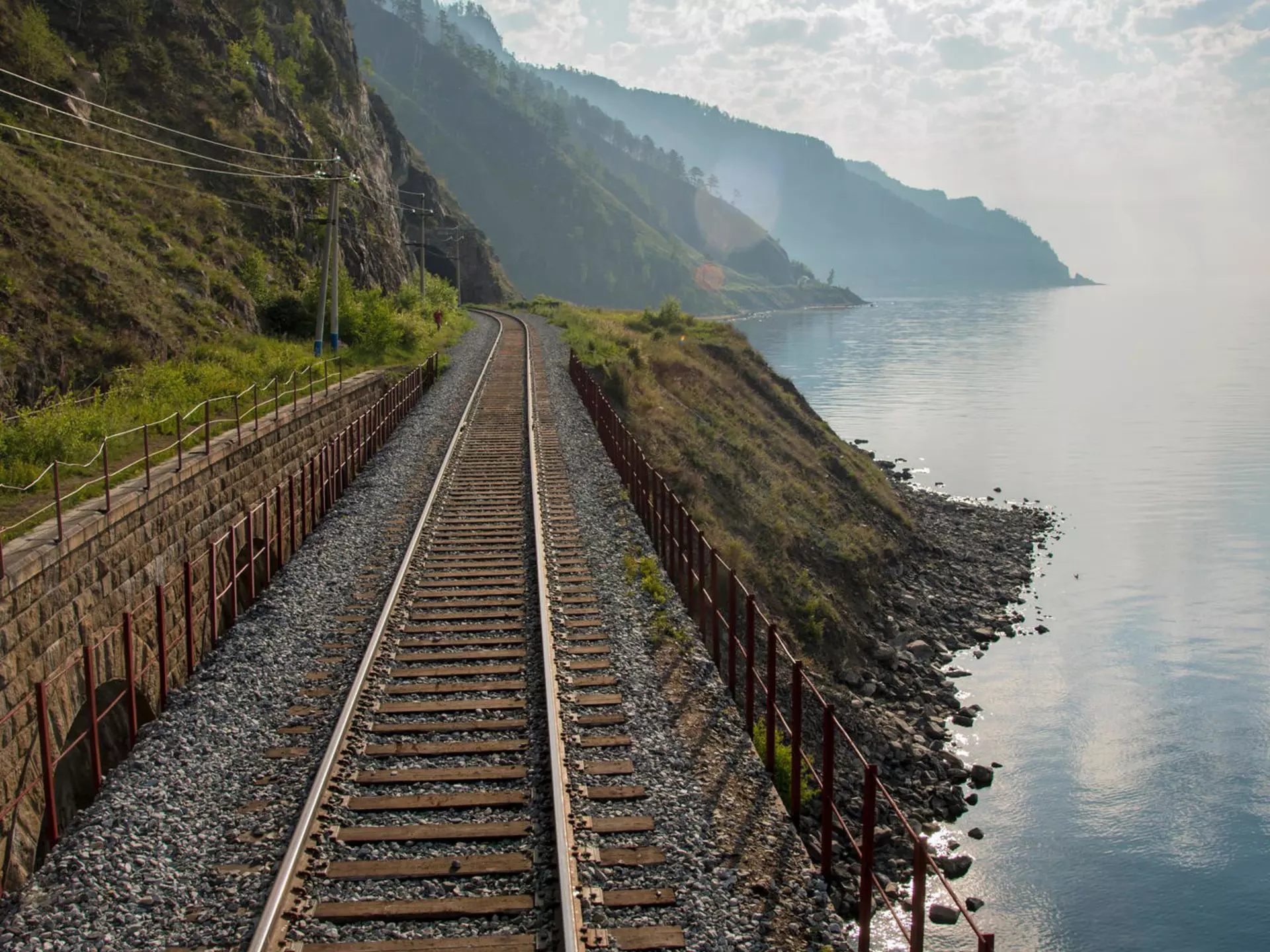 Empty train tracks on the Trans Siberian Railway, next to Lake Baikal.
KBR3T6
tracks, rail, track, sleeper, Sunshine, clouds, Mongolian, Buryatia, romance, ice, snow, winter, summer, tourists, tourist, Chinese, empty, Soviet, Vladivostok, passengers, railway, sunrise, sunset, lake, baikal, samovar, sights, sightseeing, tourism, holiday, must-see, sun