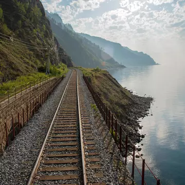 Empty train tracks on the Trans Siberian Railway, next to Lake Baikal.
KBR3T6
tracks, rail, track, sleeper, Sunshine, clouds, Mongolian, Buryatia, romance, ice, snow, winter, summer, tourists, tourist, Chinese, empty, Soviet, Vladivostok, passengers, railway, sunrise, sunset, lake, baikal, samovar, sights, sightseeing, tourism, holiday, must-see, sun