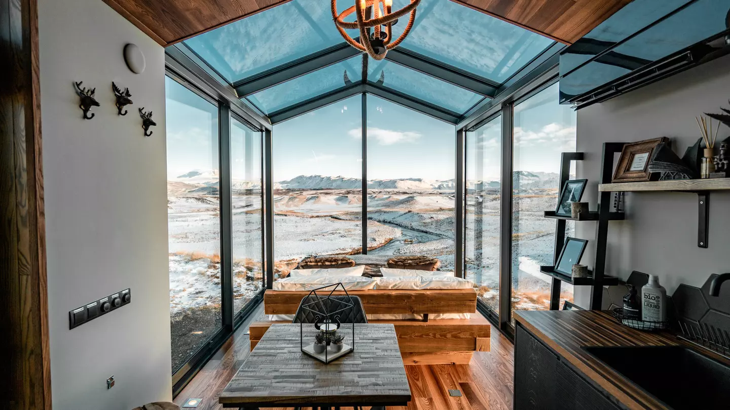 A suite with a window wall at Panorama Glass Lodge, Iceland