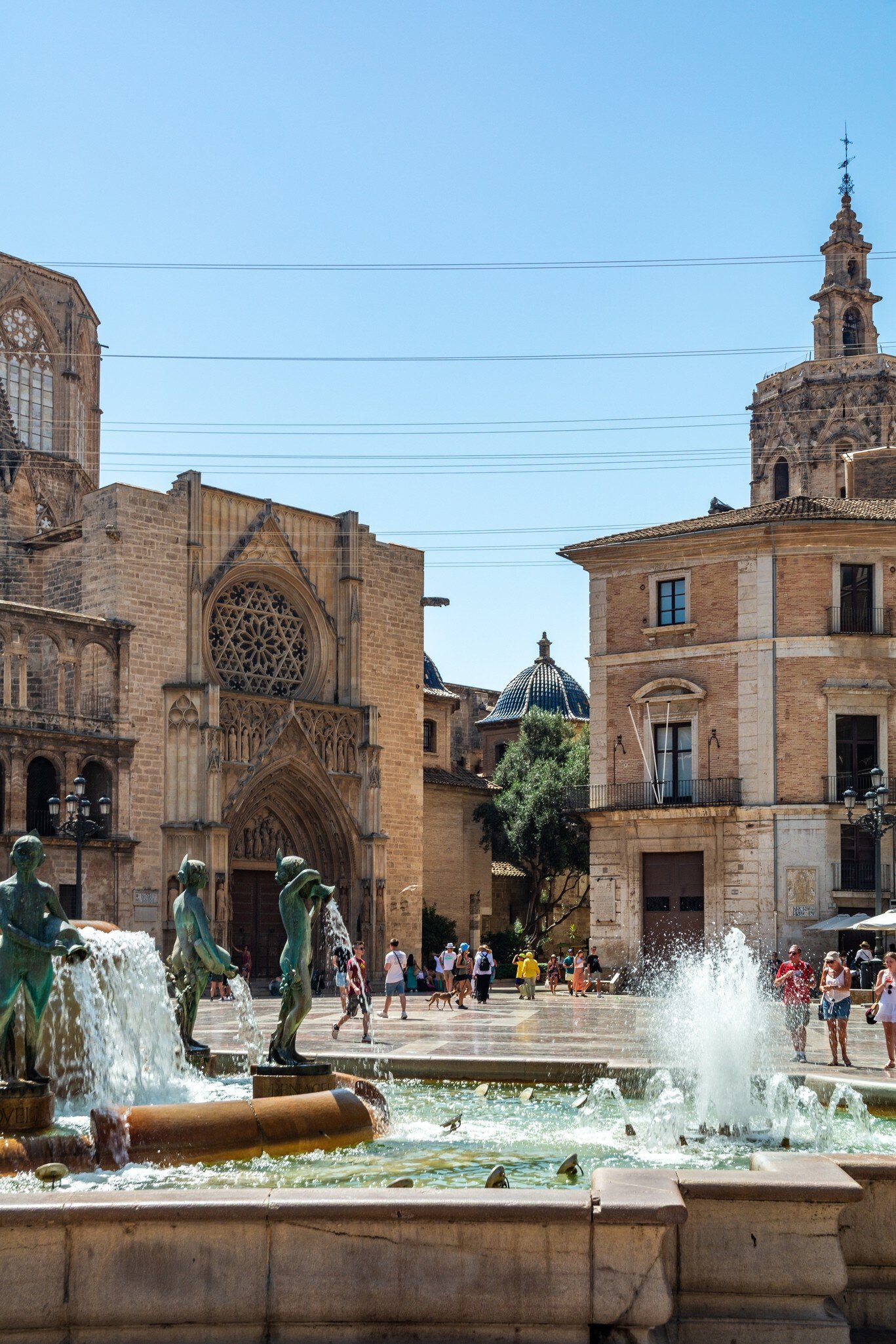 Water jets of the Fountain of the Turia in front of the Valencia Cathedral in Valencia, Spain