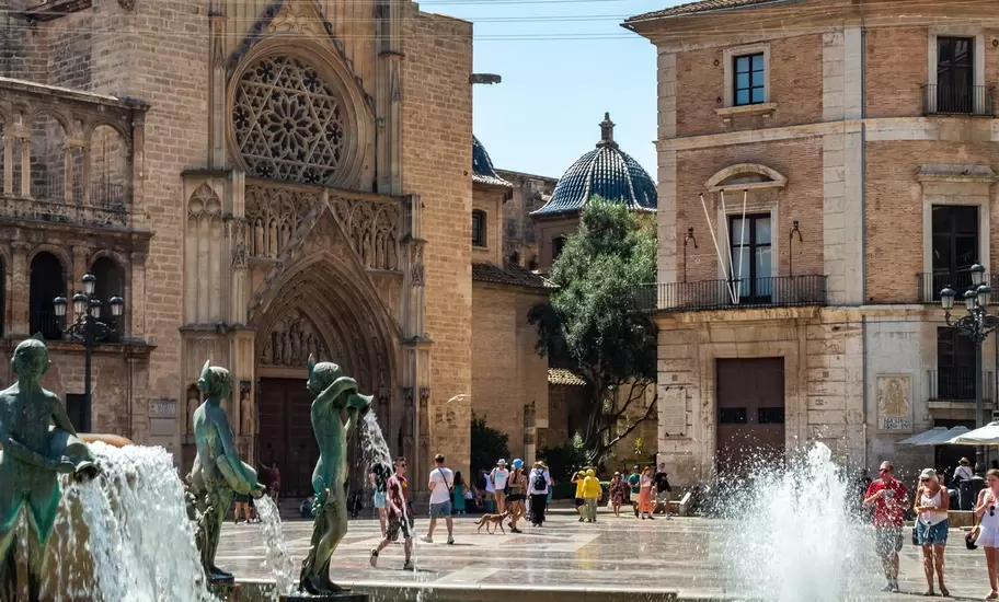 Water jets of the Fountain of the Turia in front of the Valencia Cathedral in Valencia, Spain