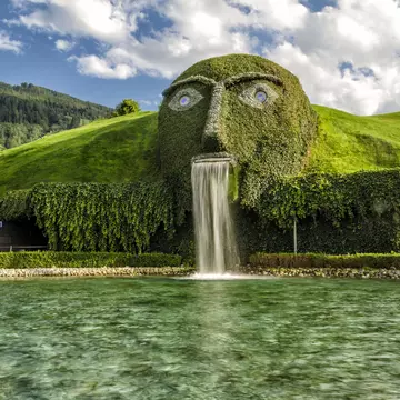 INNSBRUCK, AUSTRIA - AUGUST 16: Swarovski Kristallwelten (Crystal Worlds) crystal-themed theme park entrance on August 16, 2013 near Innsbruck, Austria.