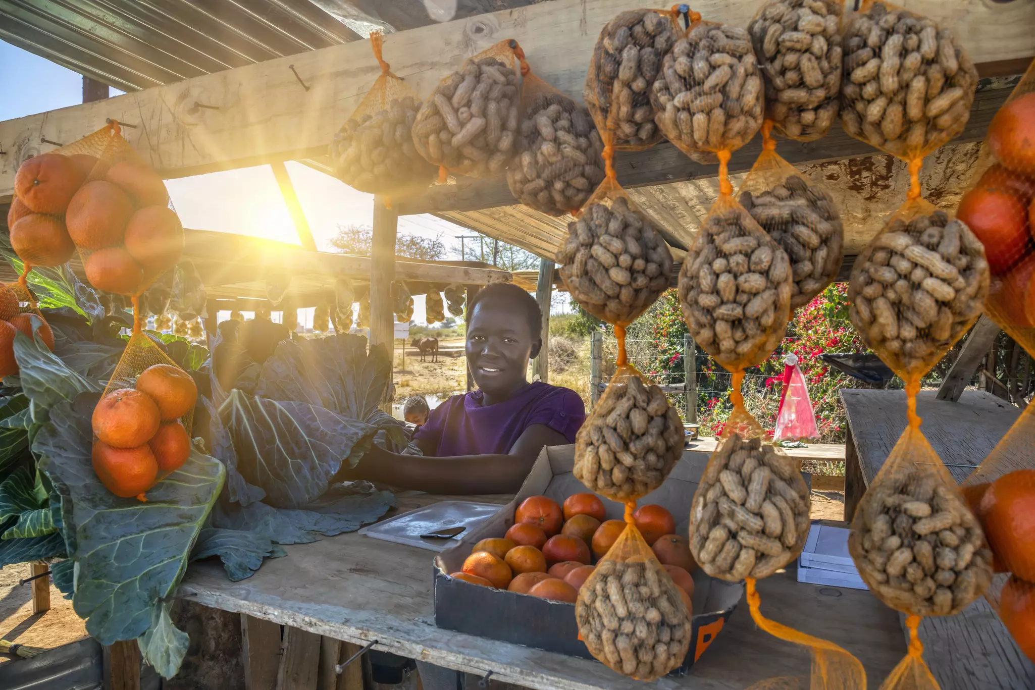 Buying food from roadside stalls and markets will save you cash © poco_bw / Getty Images