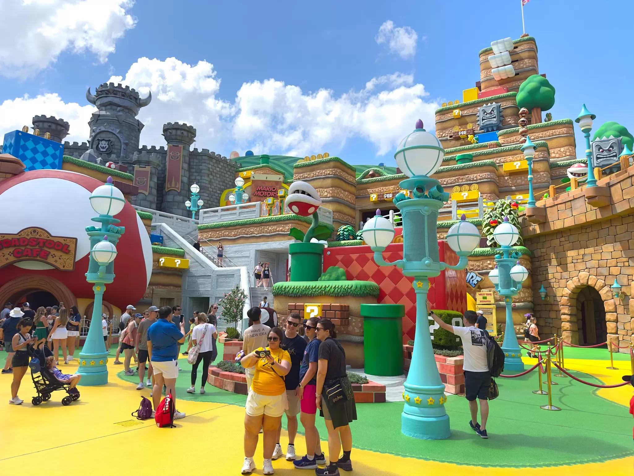 Visitors explore Super Nintendo World at Universal’s Epic Universe in Orlando, Florida, surrounded by vivid themed decor from the Super Mario franchise.