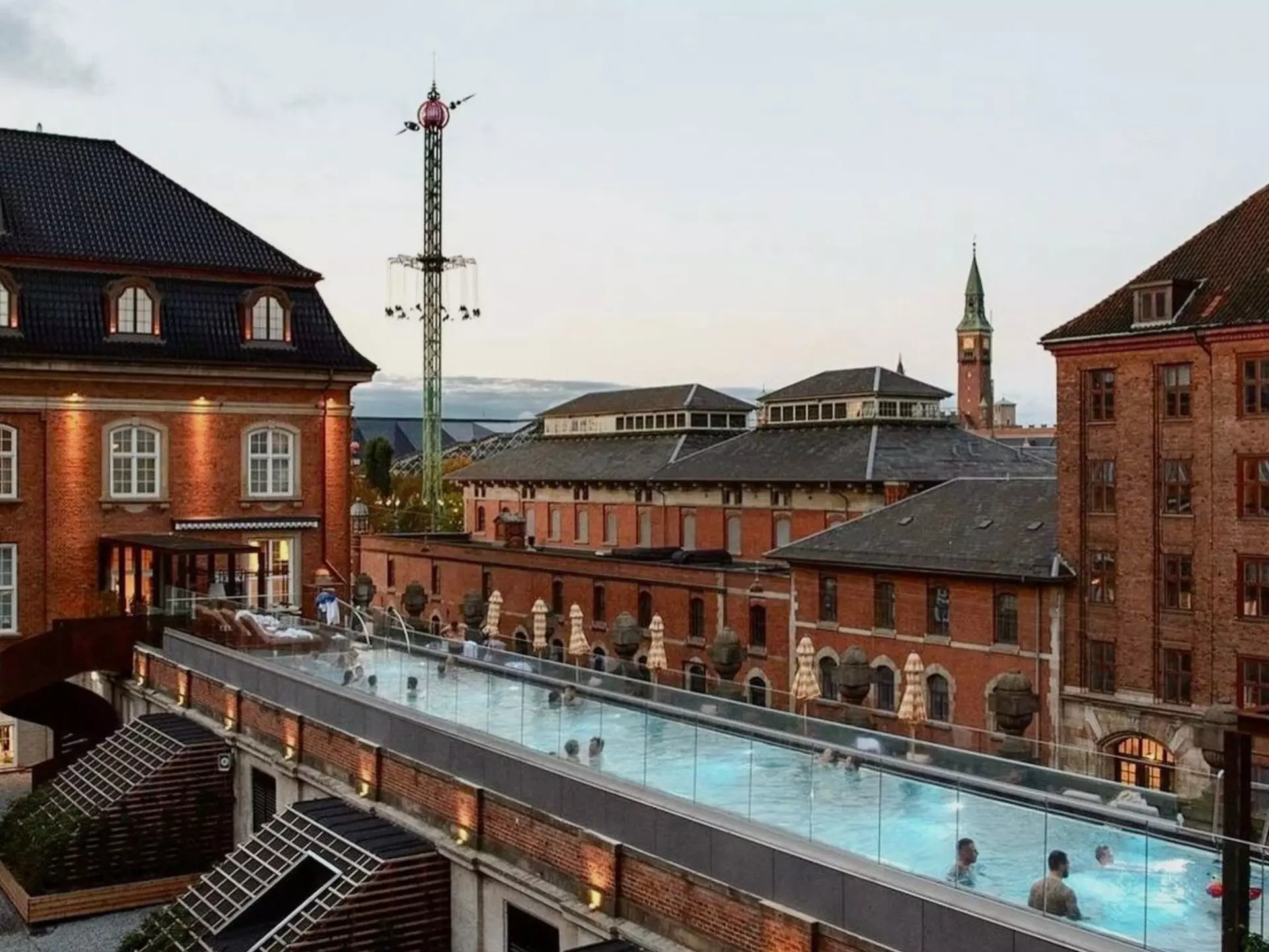 People scattered around a narrow pool