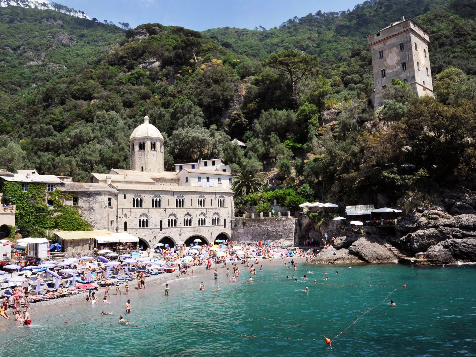 The beach and abbey at San Fruttuoso in Liguria, Italy. Guido Nicora/Shutterstock