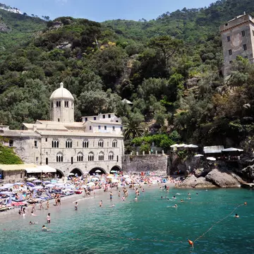 The beach and abbey at San Fruttuoso in Liguria, Italy. Guido Nicora/Shutterstock