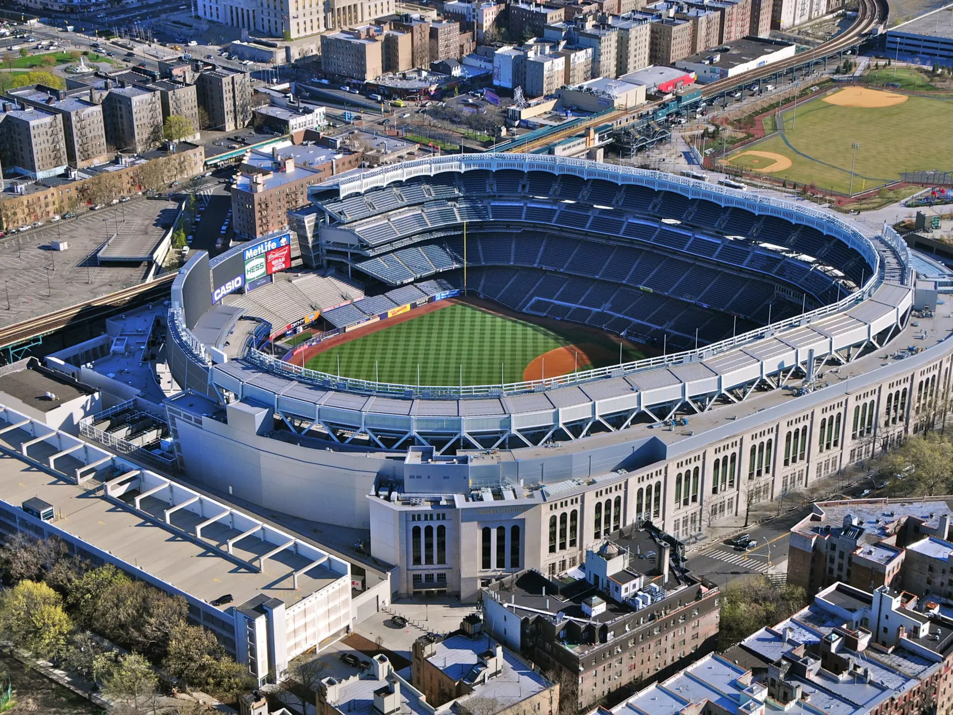 NEW YORK CITY - APRIL 6: The New Yankees Stadium on April 6th, 2012. It was achieved in 2009 and costed $ 1.5 bn. Home of the Yankees it is situated in the Bronx and can host 50000 for Baseball Games
aerial, america, american, americana, architecture, ballpark, baseball, bronx, building, city, color, colour, diamond, empty, field, helicopter, historic, horizontal, image, landmark, league, major, new, nobody, north, ny, nyc, outdoors, park, photograph, professional, recreation, site, sport, stadium, stands, states, structure, team, tourism, travel, united, urban, usa, vacant, vacation, view, yankee, york