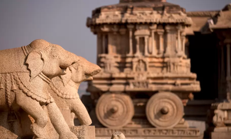 India, Karnataka, Stone Chariot and elephant figures at Vittala Temple in Hampi