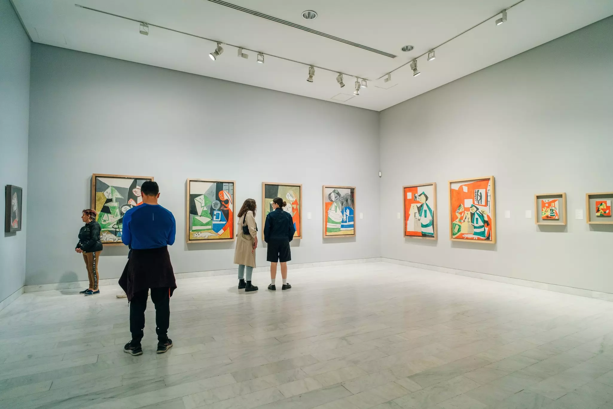 People looking at paintings at the Picasso Museum
