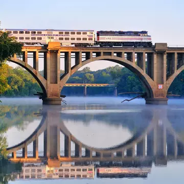 An early morning Virgina Railway Express commuter train passes over the Rappahannock River en route to Washington, D.C., 