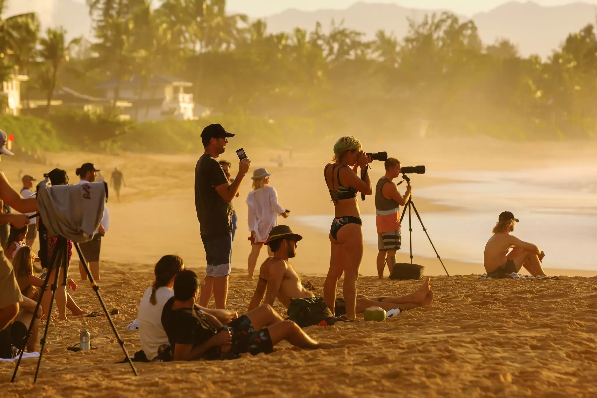 Pupukea, Oahu, Hawaii - November 05, 2019: sunset beach at the North Shore with unidentified people. This area is best known for its massive waves, attracting surfers from all around the globe, License Type: media, Download Time: 2026-05-21T16:49:48.000Z, User: lonelyplanetmedia, Editorial: true, purchase_order: 65050 - Digital Destinations and Articles, job: Comp Ingestion, client: Global Publishing WIP, other: Pia Peterson