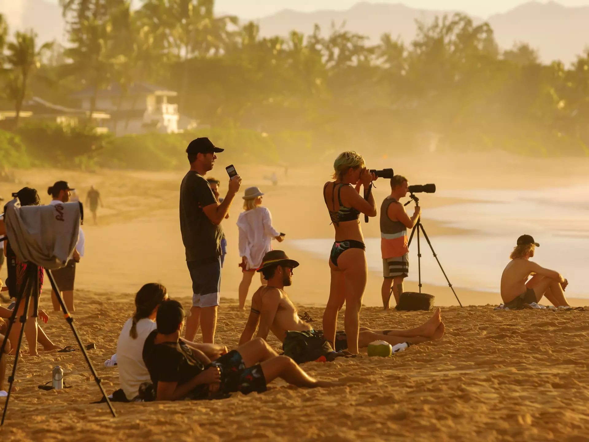 Pupukea, Oahu, Hawaii - November 05, 2019: sunset beach at the North Shore with unidentified people. This area is best known for its massive waves, attracting surfers from all around the globe, License Type: media, Download Time: 2026-05-21T16:49:48.000Z, User: lonelyplanetmedia, Editorial: true, purchase_order: 65050 - Digital Destinations and Articles, job: Comp Ingestion, client: Global Publishing WIP, other: Pia Peterson