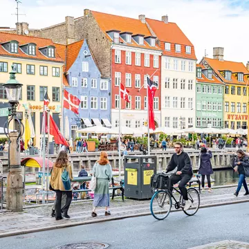 Explore colorful Nyhavn by foot or bicycle in Copenhagen, Denmark. Michele Ursi/Shutterstock