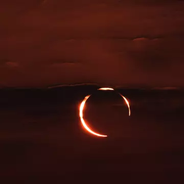 December 26, 2019. The rare Annular "ring of fire" solar eclipse as seen from the Corniche road in Doha, Qatar. Annular eclipses occur when the Moon is not close enough to the Earth to completely obscure the Sun, leaving a thin ring of the solar disc visible.
1196374941