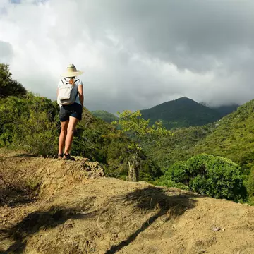 Tourist on a trail to Pico Turquino mountain in Cuba