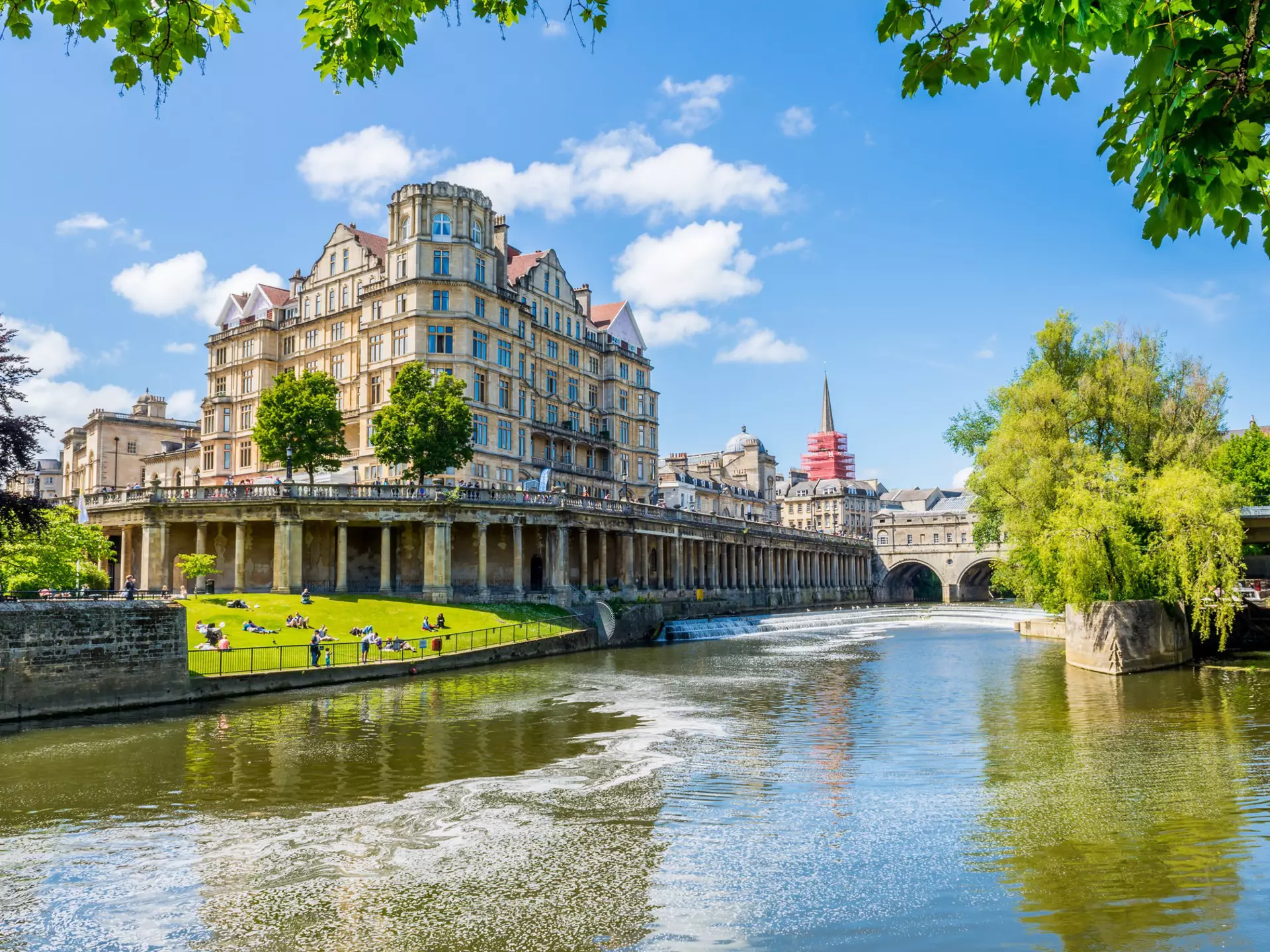 The Pulteney Bridge in Palladian style crosses the River Avon in Bath
289211630
uk, outdoor, medieval, town, river, travel, view, somerset, urban, landmark, attraction, summer, entrance, old, door, tourist, historic, church, britain, sightseeing, world, unesco, england, heritage, bath, architecture, city, british, sky, sight, house, tourism, avon, ancient, water, build, bridge, vacation, structure, europe, cityscape, palladian, pulteney, countryside