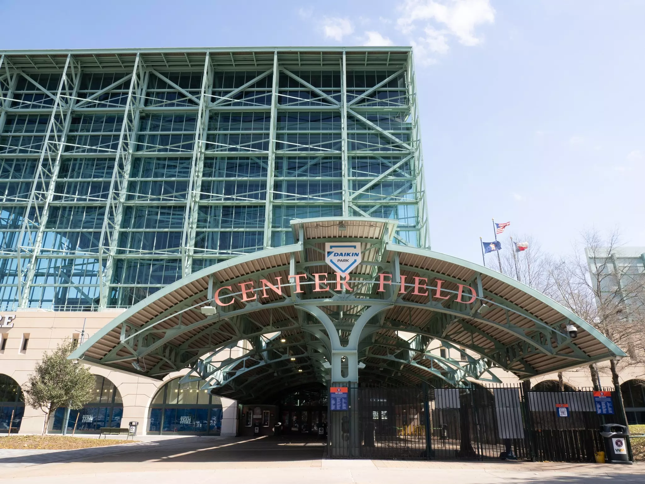 An entrance to a large stadium with a sign that says "CENTER FIELD".