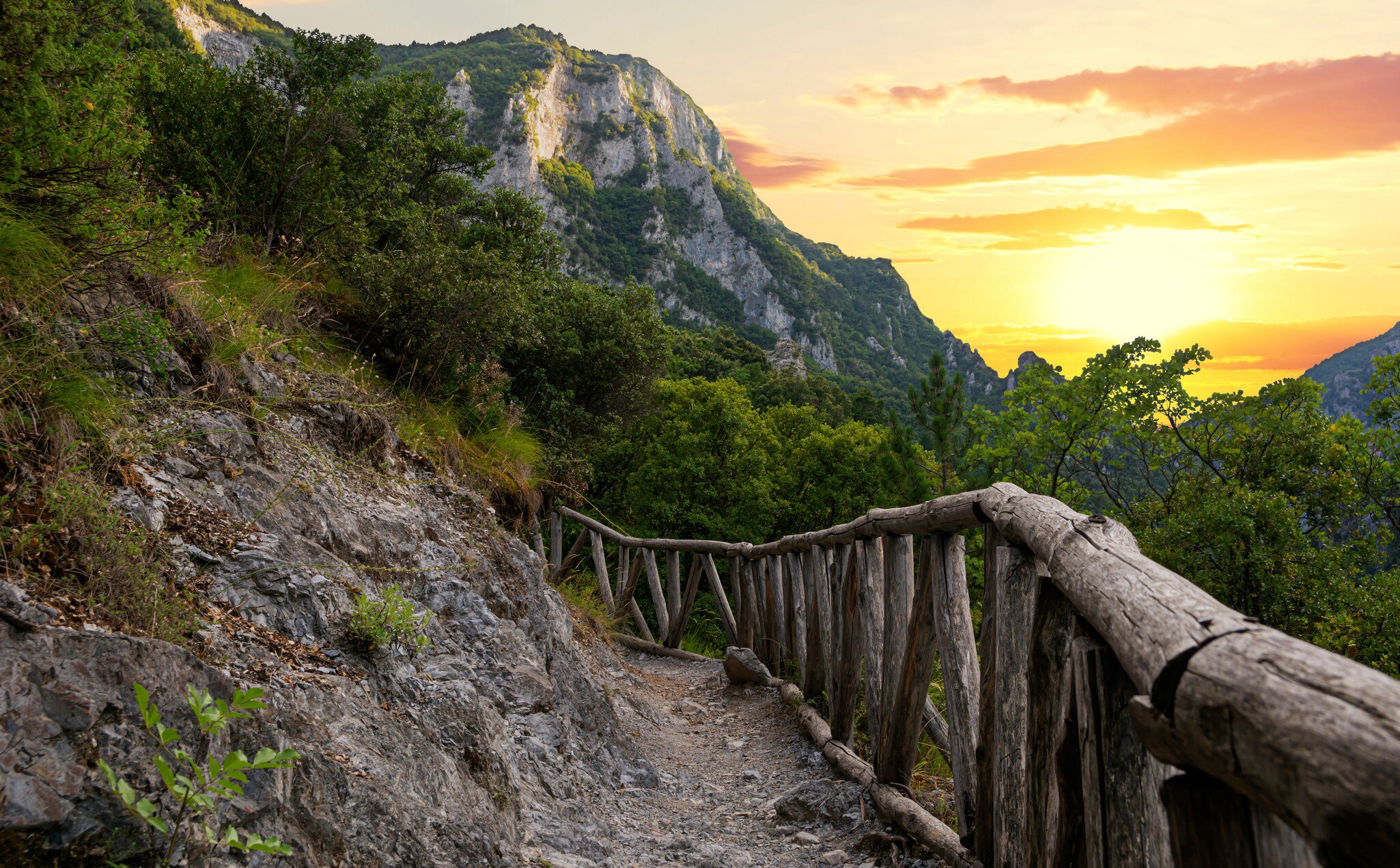 Beautiful sunset over Mount Olympus in Greece. This is the small road to Enipea source of the river Zeus Bath near the village of Litochoro; Shutterstock ID 1789244651; your: Erin Lenczycki; gl: 65050 ; netsuite: Digital; full: Digital
