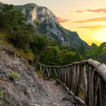 Beautiful sunset over Mount Olympus in Greece. This is the small road to Enipea source of the river Zeus Bath near the village of Litochoro; Shutterstock ID 1789244651; your: Erin Lenczycki; gl: 65050 ; netsuite: Digital; full: Digital