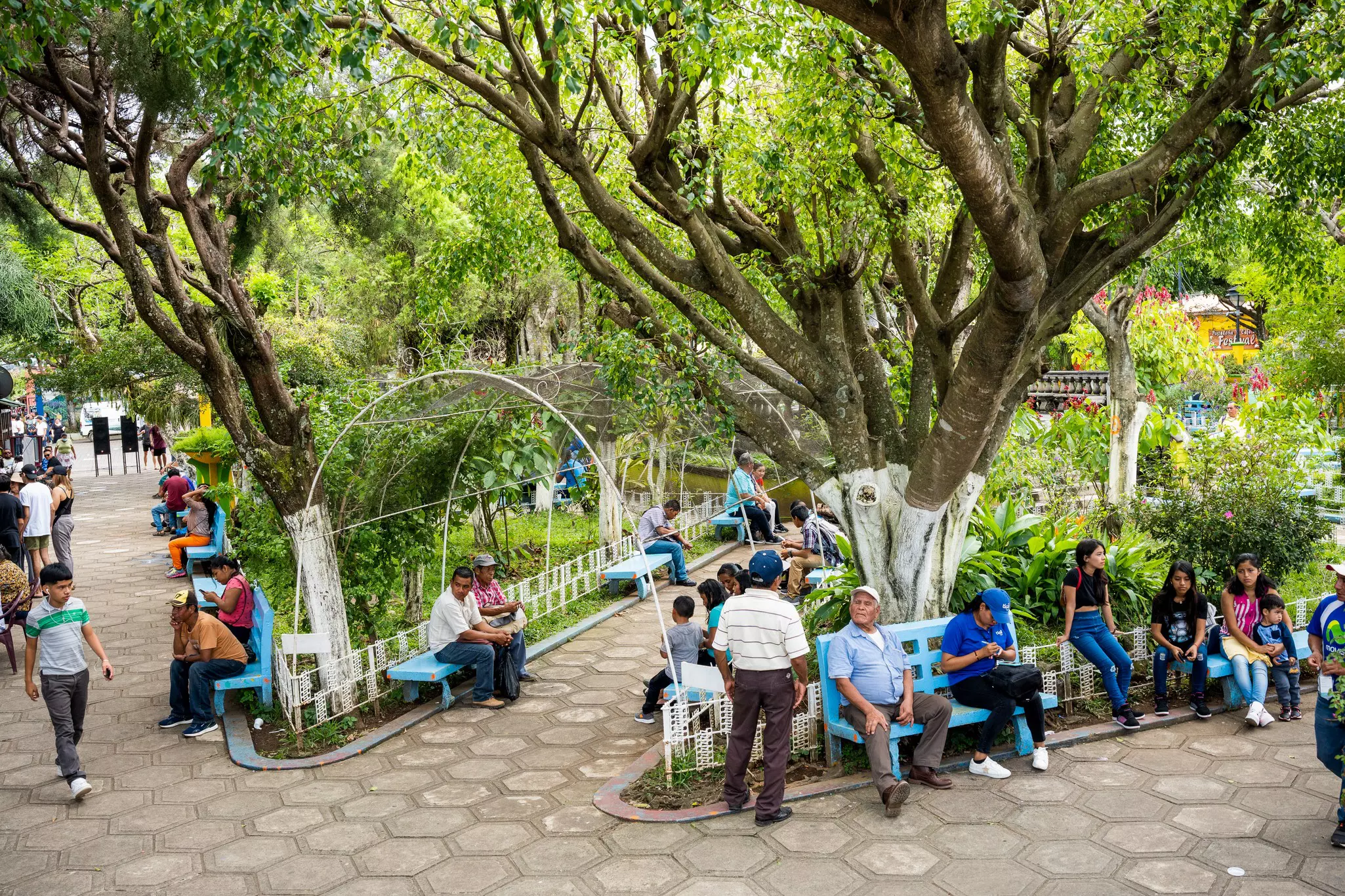People in a public park in Juayúa, a small mountain town about 50 miles from San Salvador, El Salvador.