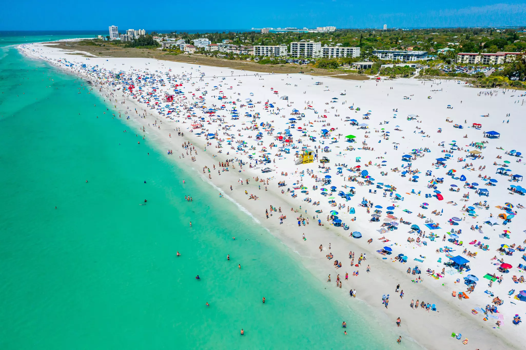 Beachgoers gather at Siesta Beach in Sarasota, Florida, USA. 