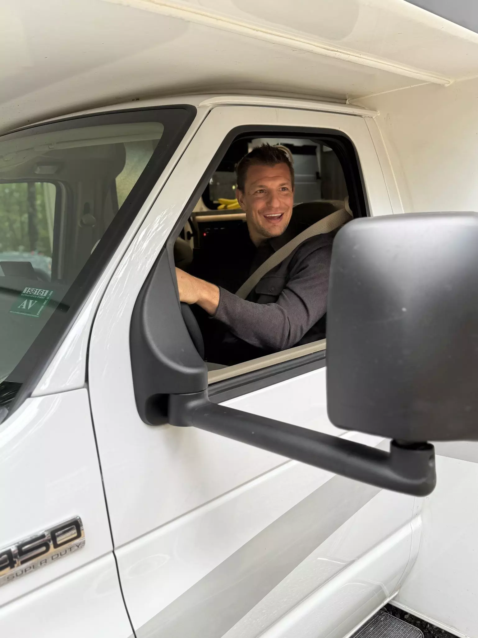 Rob Gronkowski in the driver's seat of an RV