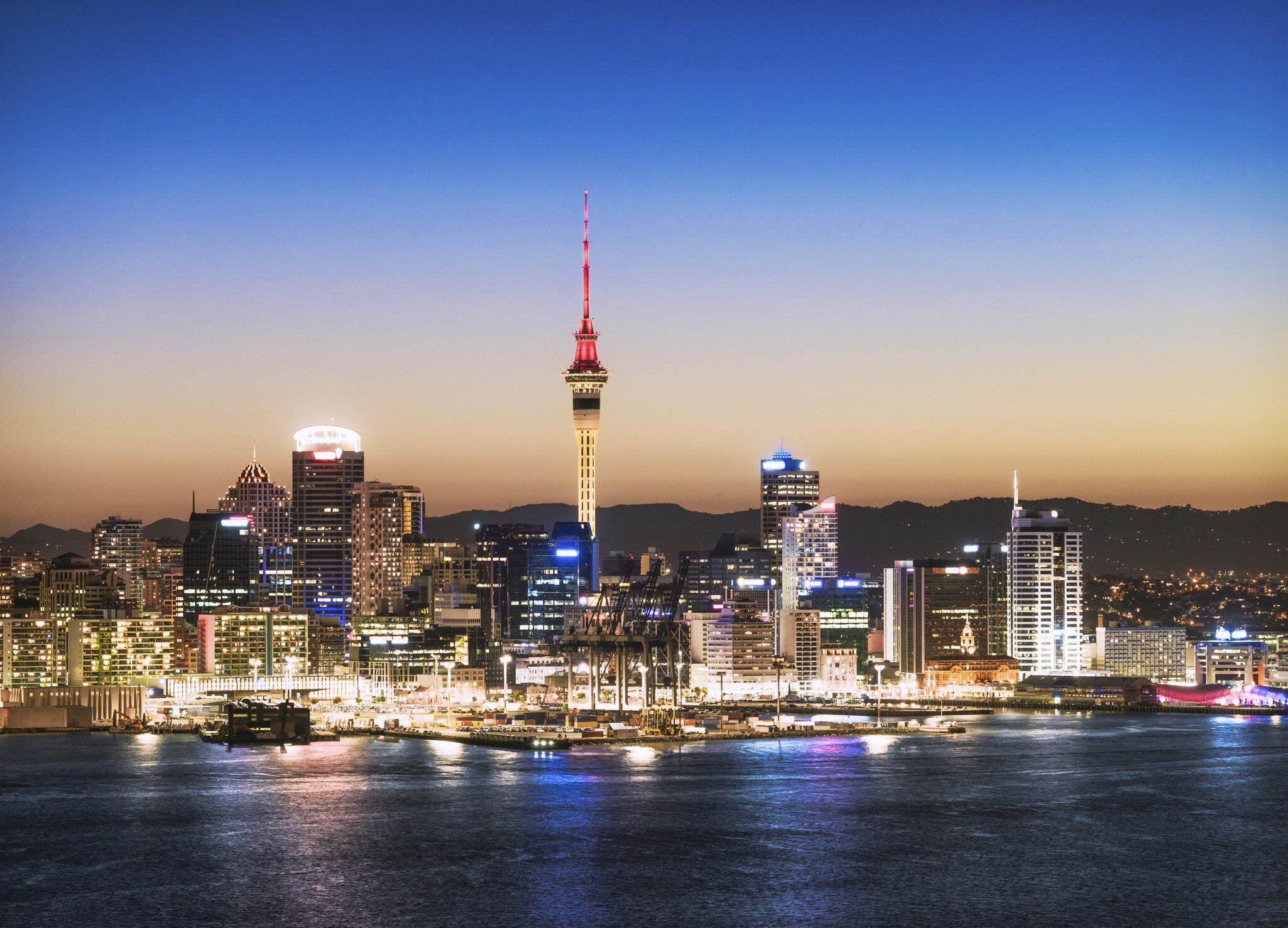 Auckland Skyline at Dusk
Harbor, Travel Destinations, Twilight, architecture, auckland, awe, building, built structure, cbd, city, city at night, cityscape, clear sky, colour, dark, downtown, downtown district, dusk, electric light, elevated view, famous place, financial district, high angle view, horizon, illuminated, international landmark, light, long exposure, majestic, national landmark, new zealand, night, panoramic, place of interest, red, reflection, scenics, sea, sky, sky tower, skyline, skytower, street light, sunset, tourism, tower, travel, travel destination, urban scene, vertical, water
The Sky Tower in the centre of the buildings of Auckland's CBD, taken after sunset.
CLEARED FOR DIGITAL USE ONLY -