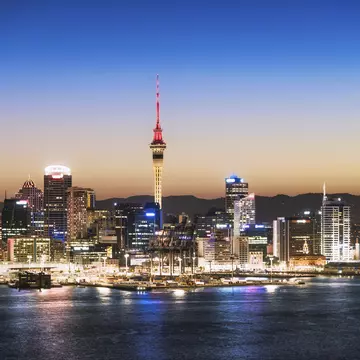 Auckland Skyline at Dusk
Harbor, Travel Destinations, Twilight, architecture, auckland, awe, building, built structure, cbd, city, city at night, cityscape, clear sky, colour, dark, downtown, downtown district, dusk, electric light, elevated view, famous place, financial district, high angle view, horizon, illuminated, international landmark, light, long exposure, majestic, national landmark, new zealand, night, panoramic, place of interest, red, reflection, scenics, sea, sky, sky tower, skyline, skytower, street light, sunset, tourism, tower, travel, travel destination, urban scene, vertical, water
The Sky Tower in the centre of the buildings of Auckland's CBD, taken after sunset.
CLEARED FOR DIGITAL USE ONLY -