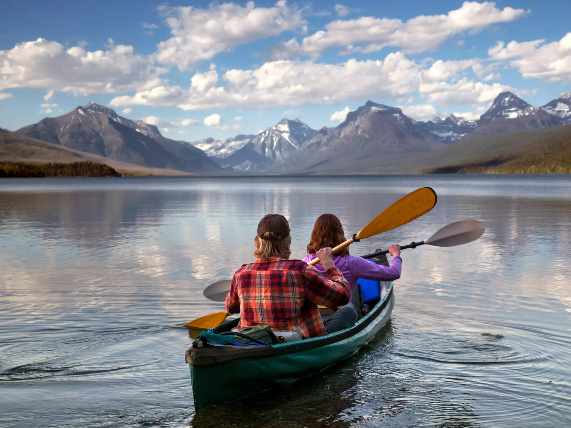 Paddling out in Glacier National Park. Shutterstock/El Nariz