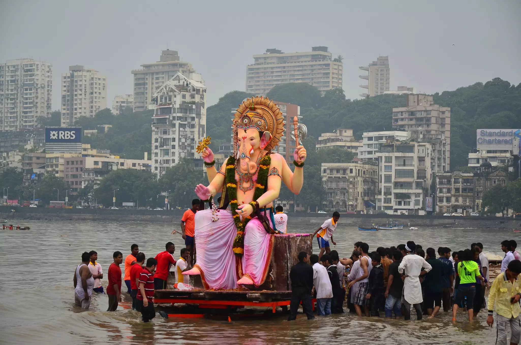 Devotees immerse a giant statue of Ganesh in the sea in Mumbai during Ganesh Chaturthi.