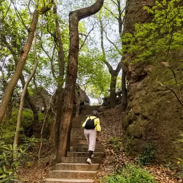 Hiker hiking the serene Boshi hill near West Lake in Hangzhou, License Type: media, Download Time: 2026-09-01T16:07:57.000Z, User: LP_NZhan, Editorial: false, purchase_order: 65050 - Digital Destinations and Articles, job: App Content, client: Lonely Planet App, other: Nadine Zhan