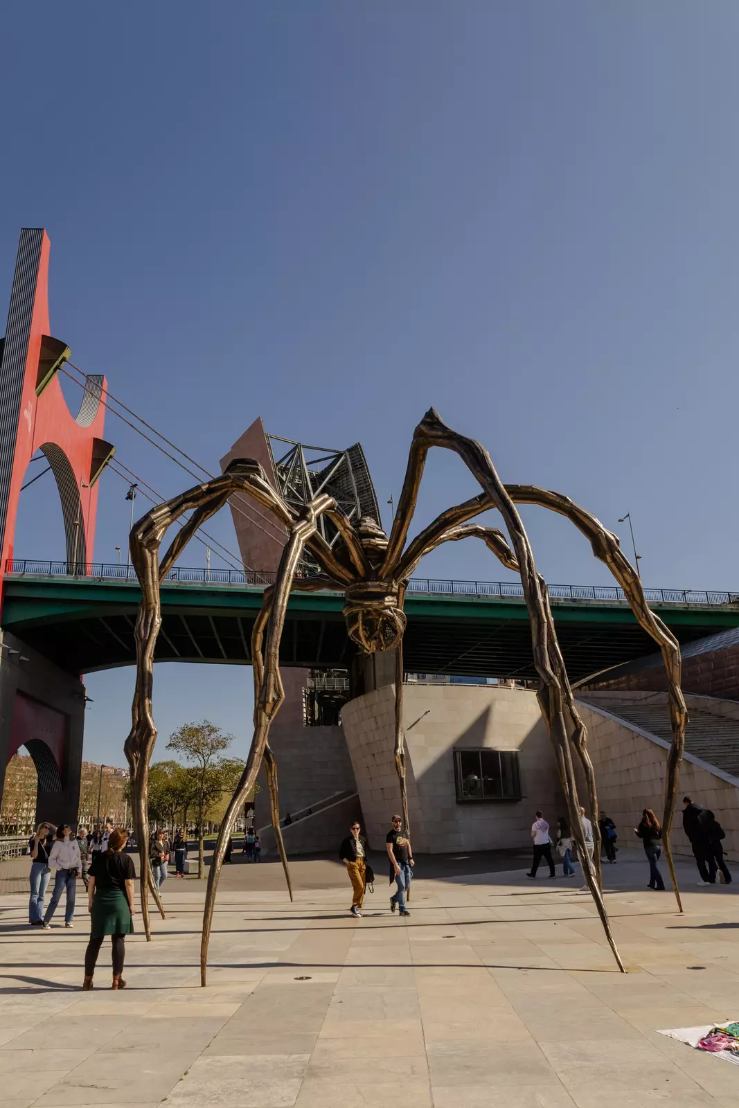 A metal sculpture with several thin legs