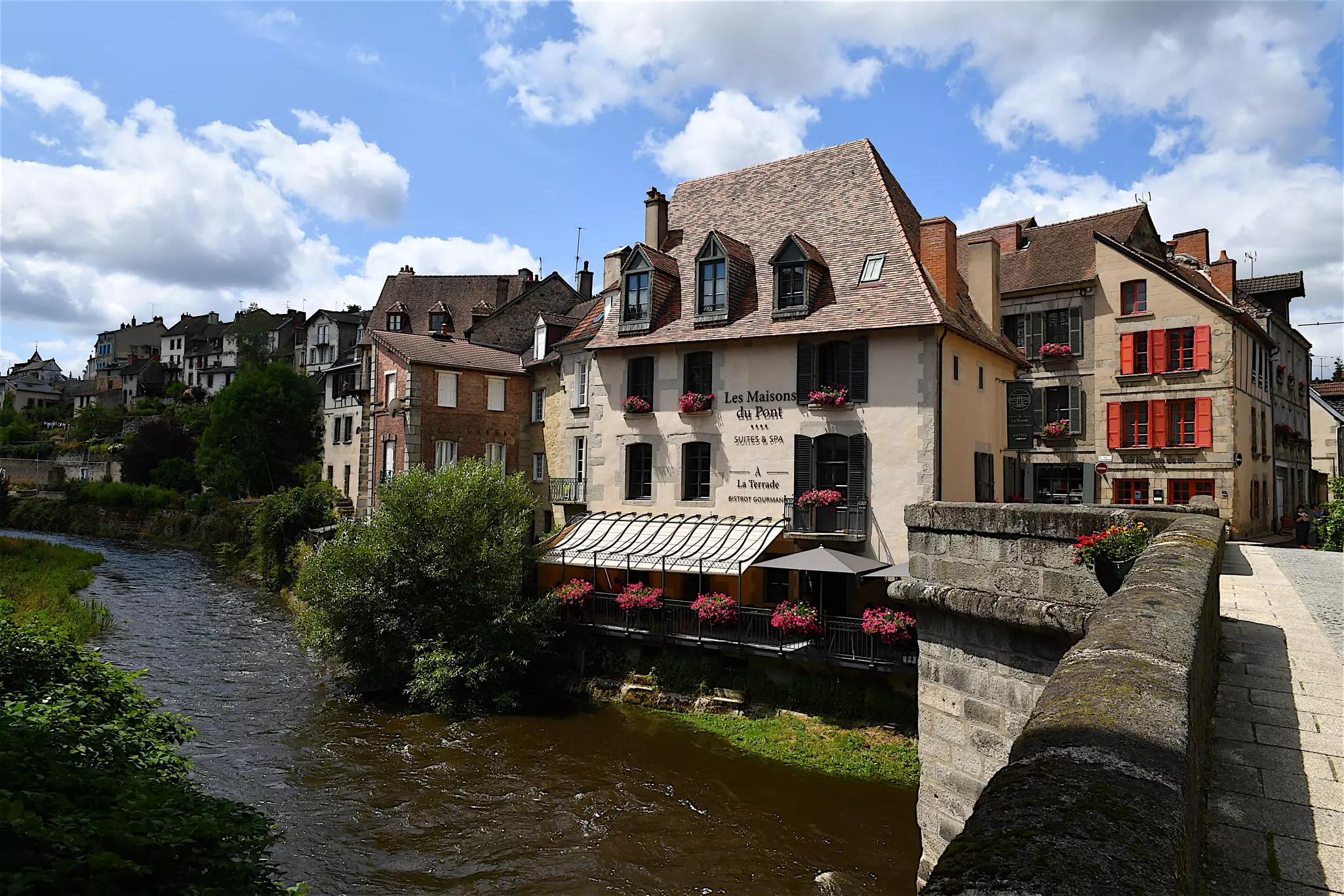 The riverside town of Aubusson, with medieval stone buildings