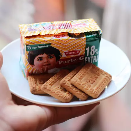 Close up of cookies with a Parle-G packet in the background