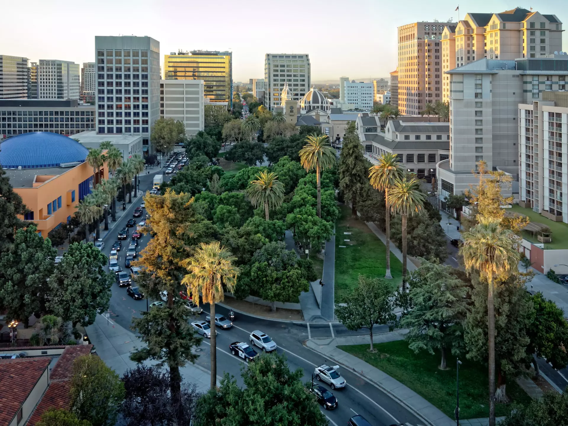 An aerial and panoramic view of the historic Plaza de Cesar Chavez in San Jose, CA.
495123798
Plaza de Cesar Chavez, Building Exterior, San Jose - California, Panoramic, Aerial View, California, Sunlight, Sunrise - Dawn, Sun, Built Structure, Golden Colors, Palm Tress