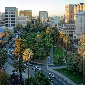 An aerial and panoramic view of the historic Plaza de Cesar Chavez in San Jose, CA.
495123798
Plaza de Cesar Chavez, Building Exterior, San Jose - California, Panoramic, Aerial View, California, Sunlight, Sunrise - Dawn, Sun, Built Structure, Golden Colors, Palm Tress