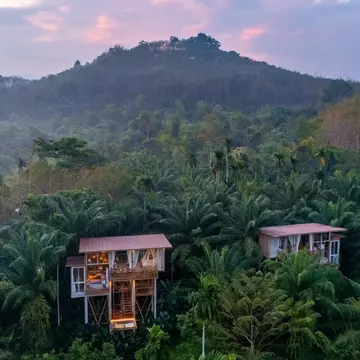 Cabins among trees at Lake Rudolph Campground, Indiana