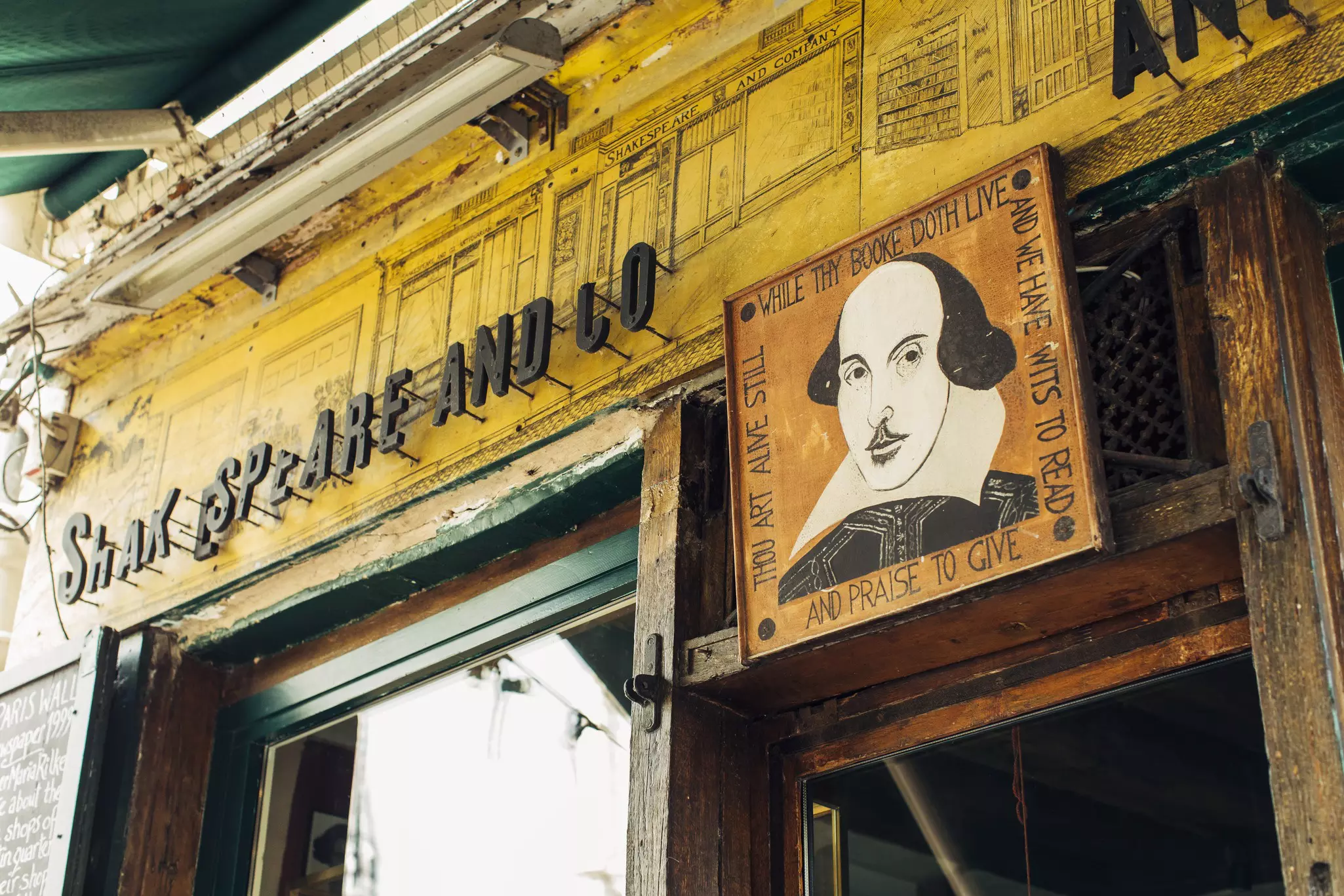 The front sign of Shakespeare & Co bookstore. ©Adrienne Pitts/Lonely Planet