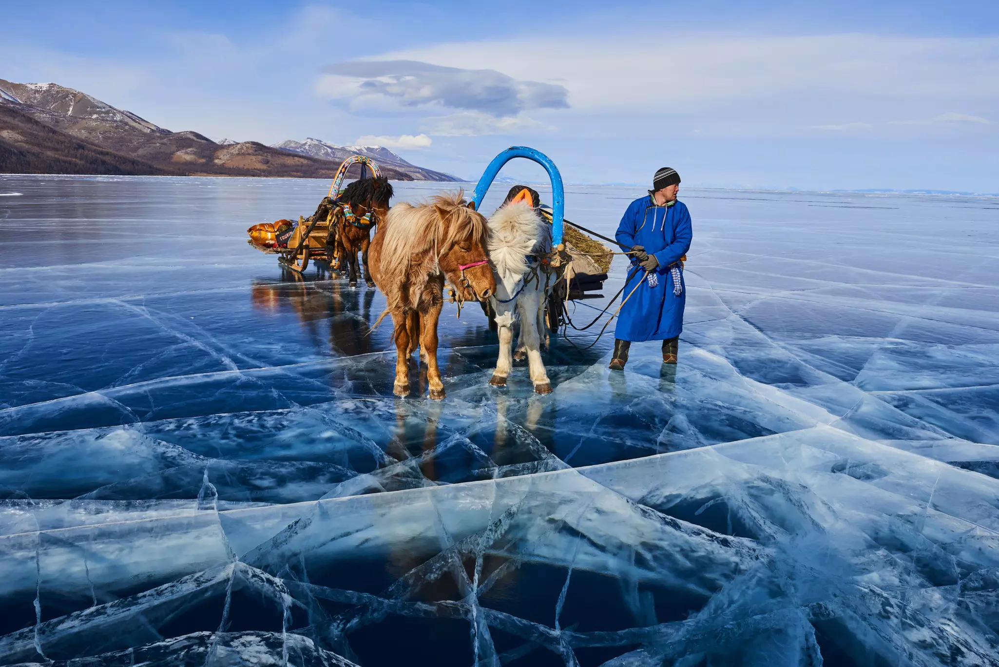 Ice-sledding is popular on Khövsgöl Nuur outside of the summer season  © Tuul & Bruno Morandi / Getty Images