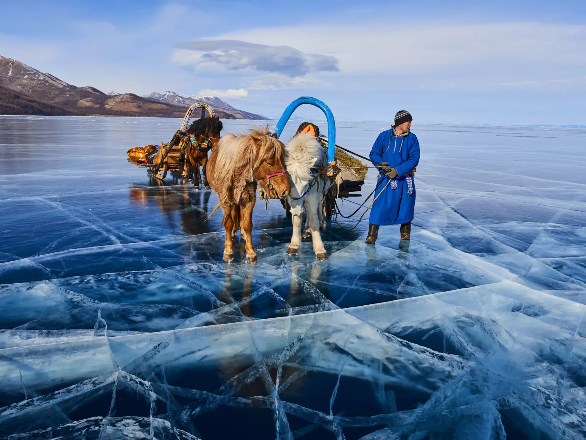 Ice-sledding is popular on Khövsgöl Nuur outside of the summer season  © Tuul & Bruno Morandi / Getty Images