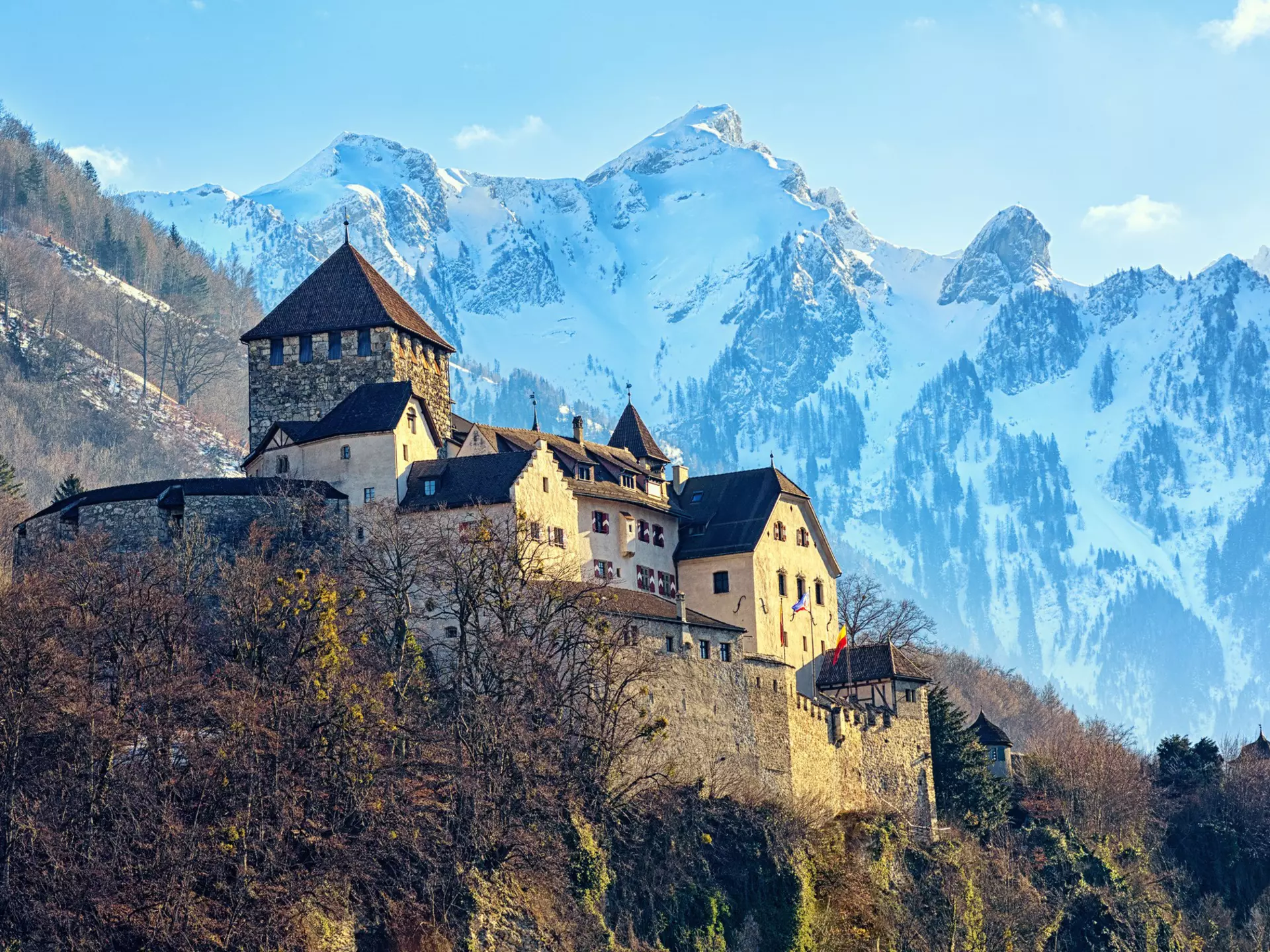 Vaduz Castle surrounded by snow-covered peaks. Boris Stroujko/Shutterstock