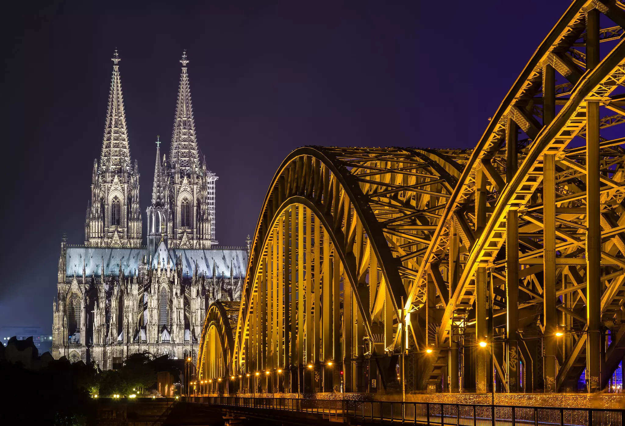 The Cologne cathedral lit up at night.