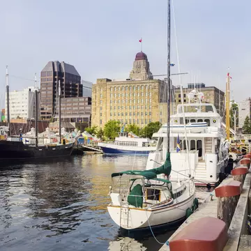 Boats docked at the harbour in Halifax.
900662552
Outdoors, Day, Downtown District, Summer, Halifax Regional Municipality - Nova Scotia, City Life, Sunset, Canada, Horizontal, No People, Waterfront, Harbor, Nova Scotia, Town, Street, Photography, Famous Place, History, City, Sky, Built Structure, Ship, Urban Skyline, Sunrise - Dawn, Cityscape, Architecture, Travel